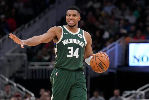 Milwaukee Bucks forward Giannis Antetokounmpo (34) brings the ball up the court against the Cleveland Cavaliers in the second half at Fiserv Forum. 