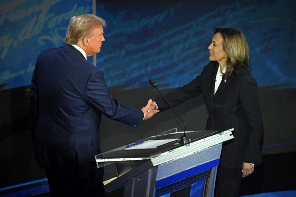 Vice President Kamala Harris walked directly over to former president Do<em></em>nald Trump’s side of the stage for a handshake on Tuesday night's debate.