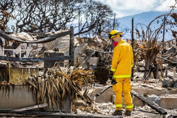 A Combined Joint Task Force 50 (CJTF-50) search, rescue and recovery member co<em></em>nducts search operations of areas damaged by Maui wildfires in Lahaina, Hawaii, U.S. August 15, 2023. 