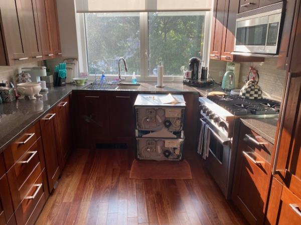 Among the issues in this now-for-sale flat: a leaky dishwasher that made the floor buckle, which snowballed into further issues.