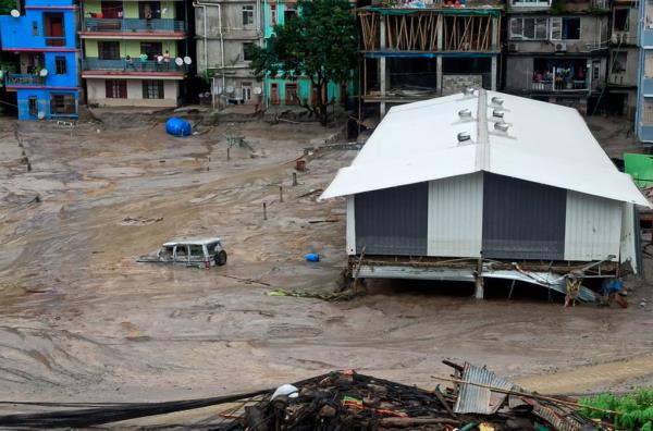 Some army camps and vehicles were submerged under mud following the floods.