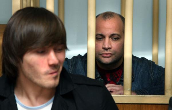 Sergei Khadzhikurbanov (back) pictured with fellow suspect Ibragim Makhmudov.