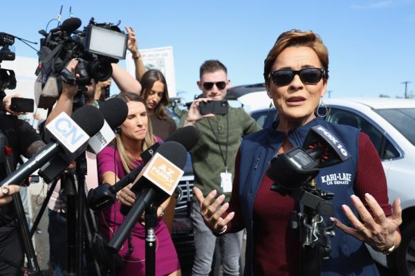 Arizona Republican U.S. Senate candidate Kari Lake speaks with the media outside the Mesa Co<em></em>nvention Center polling place on November 05, 2024 in Mesa, Arizona. 