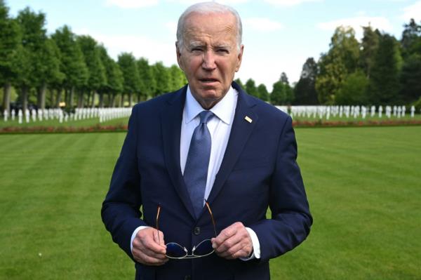 President Joe Biden looks on as he visits the Aisne-Marne American Cemetery to pay his tribute to fallen US soldiers of the World War I, in Belleau, Northern France.