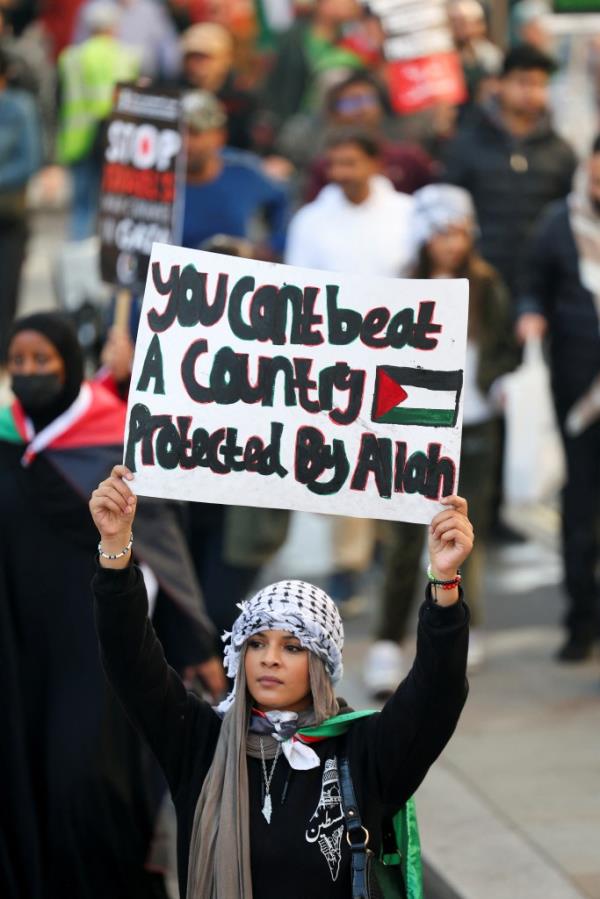 A photo of a woman supporting Palestinians in London.