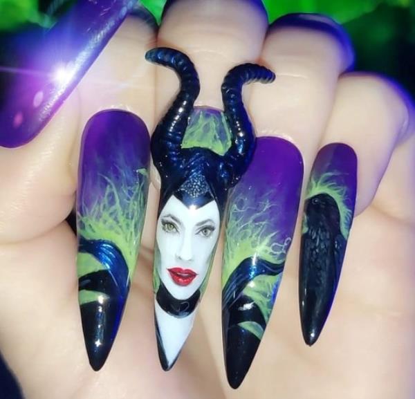 Kassie Payne's Malificent nail set. Photo released September 28 2023. See SWNS story SWTPnails. A mum-of-one who quit her job to become a nail artist says trolls say her ?900 sets are overpriced ? but she says they?re collectable art. Kassie Payne, 34, paints elaborate portraits o<em></em>nto press-on nails, sometimes as small as just three centimetres. Her most intricate designs can take up to 45 hours to complete. The mum says trolls tell her no one would pay ?900 a set for fake nails - but she hits back by explaining they?re collectable art pieces.