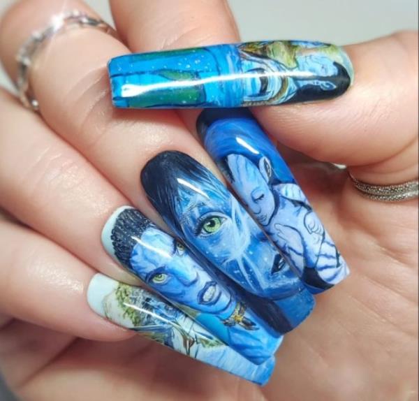 Kassie Payne's Avatar nail set. Photo released September 28 2023. See SWNS story SWTPnails. A mum-of-one who quit her job to become a nail artist says trolls say her ?900 sets are overpriced ? but she says they?re collectable art. Kassie Payne, 34, paints elaborate portraits o<em></em>nto press-on nails, sometimes as small as just three centimetres. Her most intricate designs can take up to 45 hours to complete. The mum says trolls tell her no one would pay ?900 a set for fake nails - but she hits back by explaining they?re collectable art pieces.