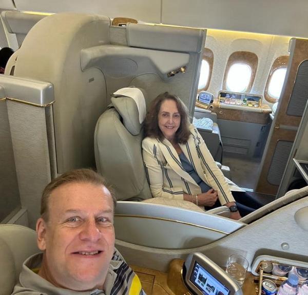 Harding, an avid aviator, posing with his wife Linda Bunbar Szasz during an undated trip. 