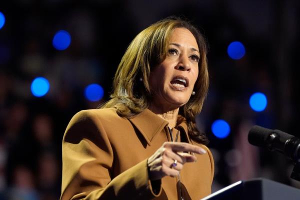 Vice President Kamala Harris speaking at a campaign rally at the Wings Event Center in Kalamazoo, Michigan