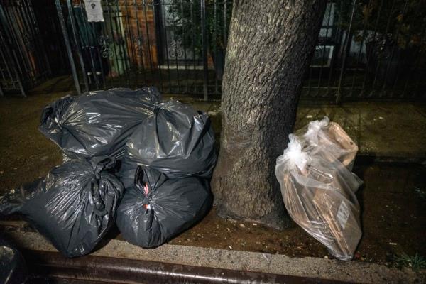 Dominick Romeo, an unio<em></em>n member building superintendent protests the new city trash regulations, which mandate take out after 8pm