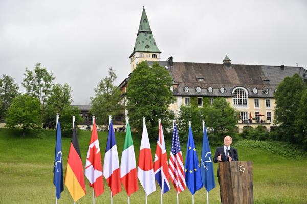 Germany's Chancellor Olaf Scholz speaking outside of Schloss Elmau during the G7 summit on June 28, 2022.