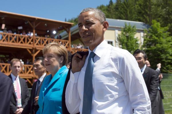 President Obama with German Chancellor Angela Merkel at the 2015 G7 summit in Schloss Elmau on June 7, 2015,