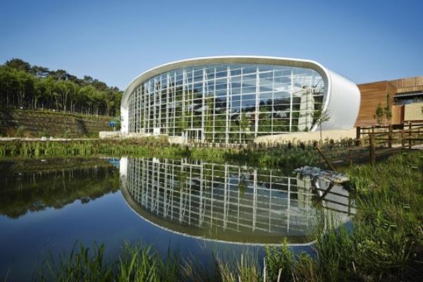 Undated Center Parcs handout photo of their new holiday village in Woburn Forest, Bedfordshire, which welcomes its first guests today in a move likely to inject more than ?20 million a year into the local economy. PRESS ASSOCIATION Photo. Issue date: Friday June 6, 2014. The new ?250 million Center Parcs will cater for around 350,000 guests a year and boasts a subtropical swimming area, 625 lodges, a 75-bedroom hotel and restaurants, shops and leisure facilities. See PA story TOURISM CenterParcs. Photo credit should read: Center Parcs/PA Wire NOTE TO EDITORS: This handout photo may o<em></em>nly be used in for editorial reporting purposes for the co<em></em>ntemporaneous illustration of events, things or the people in the image or facts mentio<em></em>ned in the caption. Reuse of the picture may require further permission from the copyright holder.