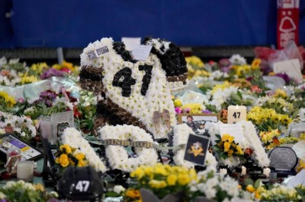 Floral tributes outside the Motorpoint Arena, Nottingham, ahead of a memorial for Nottingham Panthers' ice hockey player Adam Johnson. Adam Johnson died after an accident during a Challenge Cup match with Sheffield Steelers last Saturday. Picture date: Saturday November 4, 2023. PA Photo. See PA story ICEHOCKEY Nottingham. Photo credit should read: Zac Goodwin/PA Wire.