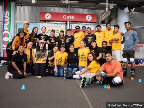 A group picture of Skate Club Singapore at the 100Plus Promenade in Singapore June 2, 2024. — TODAY pic