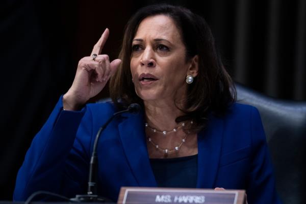 Senator Kamala Harris in a blue suit, asking a question during a Judiciary Committee hearing in the Dirksen Senate Office Building, Washington DC, June 16, 2020