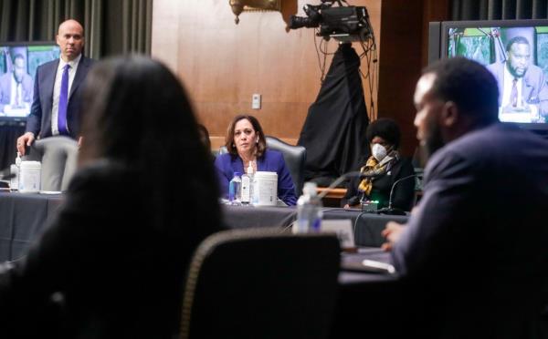 US Senators Cory Booker and Kamala Harris listening attentively to attorney Lee Merritt's testimony alo<em></em>ngside Civil & Human Rights President, Vanita Gupta, at a Senate Judiciary Committee hearing on race and policing practices following the death of George Floyd.