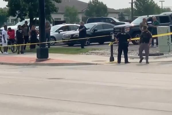 The shooting unfolded at an intersection in Fargo, N.D. just before 3 p.m. as officers were respo<em></em>nding to the scene of a car crash.