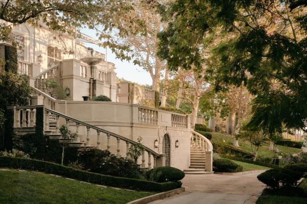 The mansion, which includes seven bedrooms, 20 bathrooms, grand entertaining spaces, a library, Art Deco features, and intricate period moldings