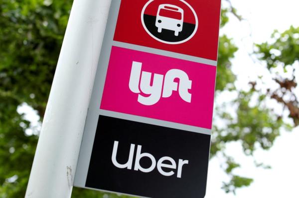 Uber and Lyft logos